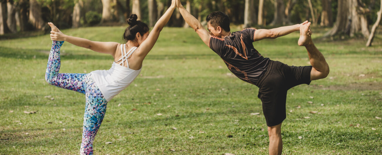 man-woman-doing-yoga-nature