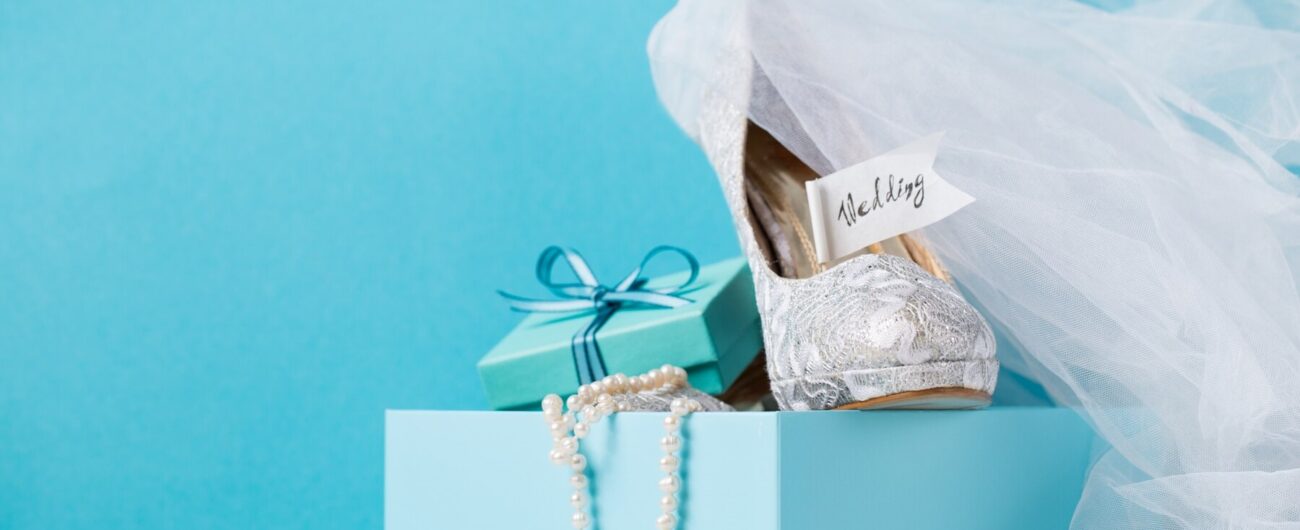 blue-box-with-bridal-shoes-composition_1220-1779